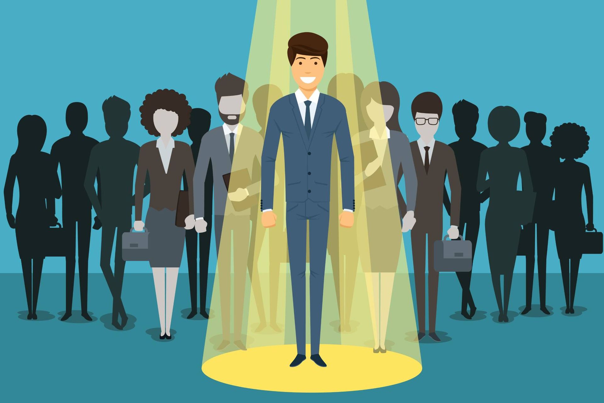 A man in a suit is standing in front of a crowd of people.