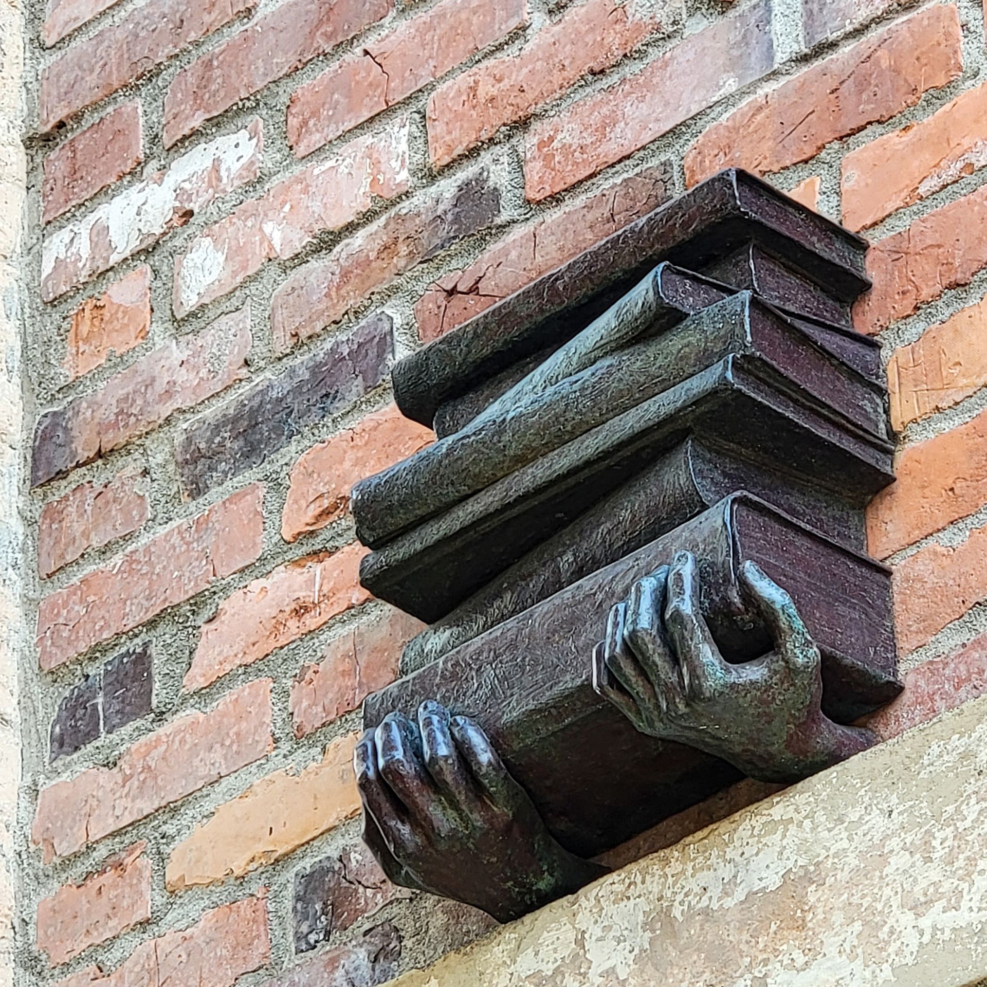 Hands of Time: Carrying Books