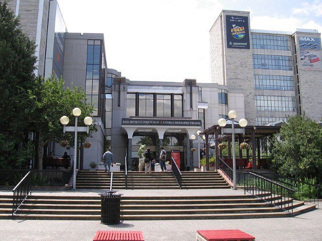 A large building with stairs leading up to it
