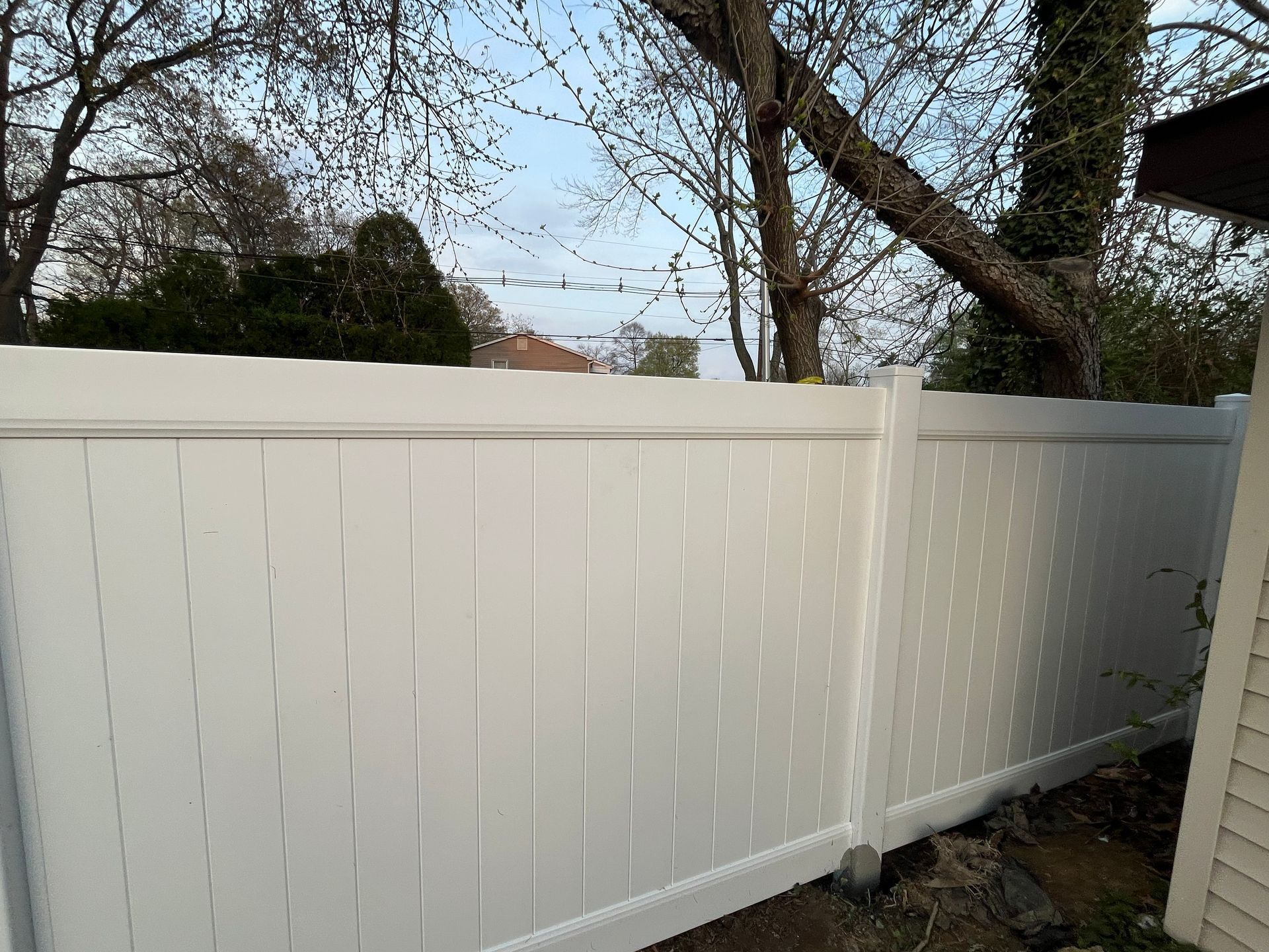 Completed white vinyl fence replacement project in Burlington County NJ