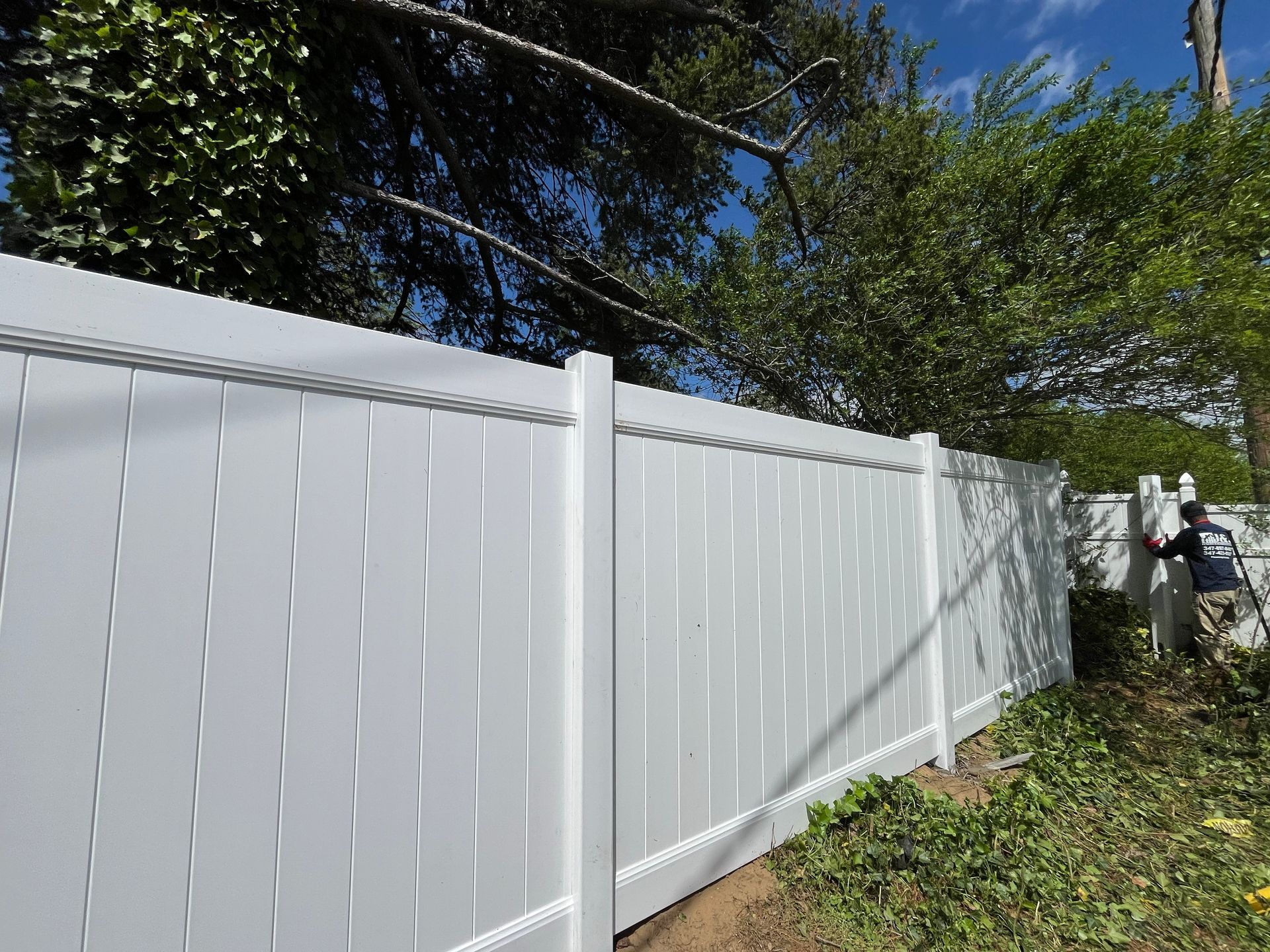 Long run white vinyl fence replacement project in Burlington County NJ