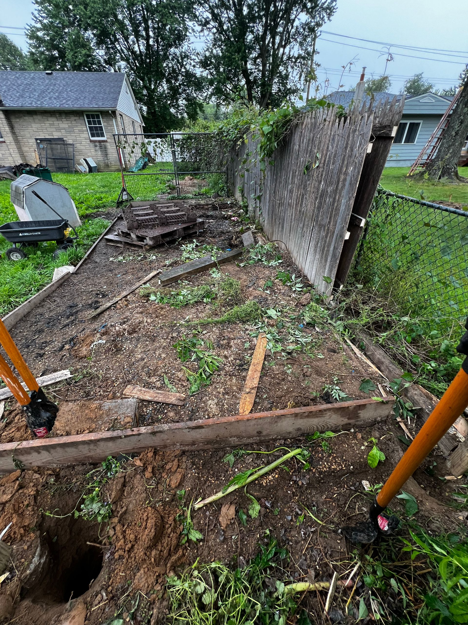 Old wooden fence removal before replacement in Burlington County NJ