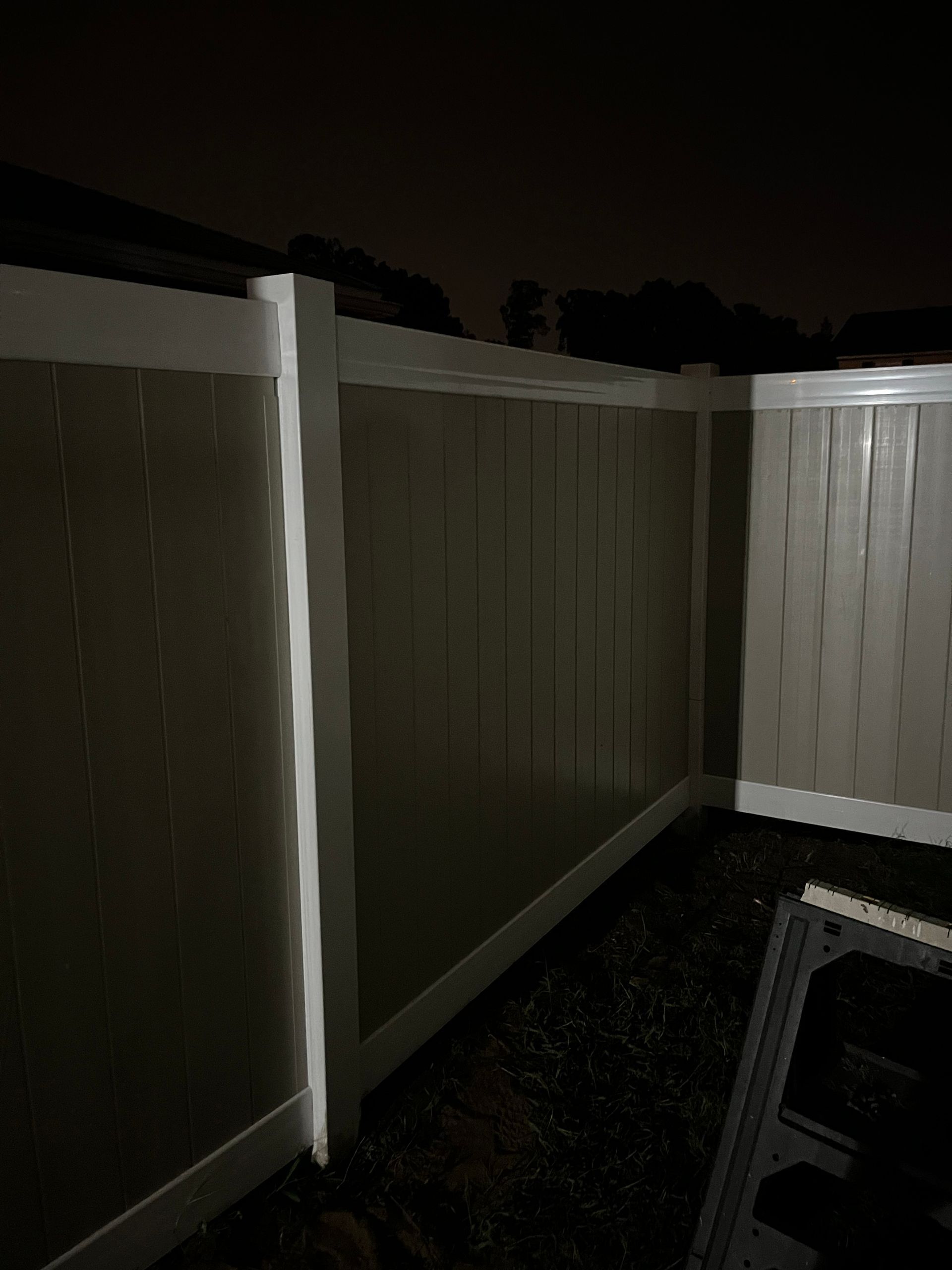 Residential vinyl privacy fence corner installation in Burlington County NJ