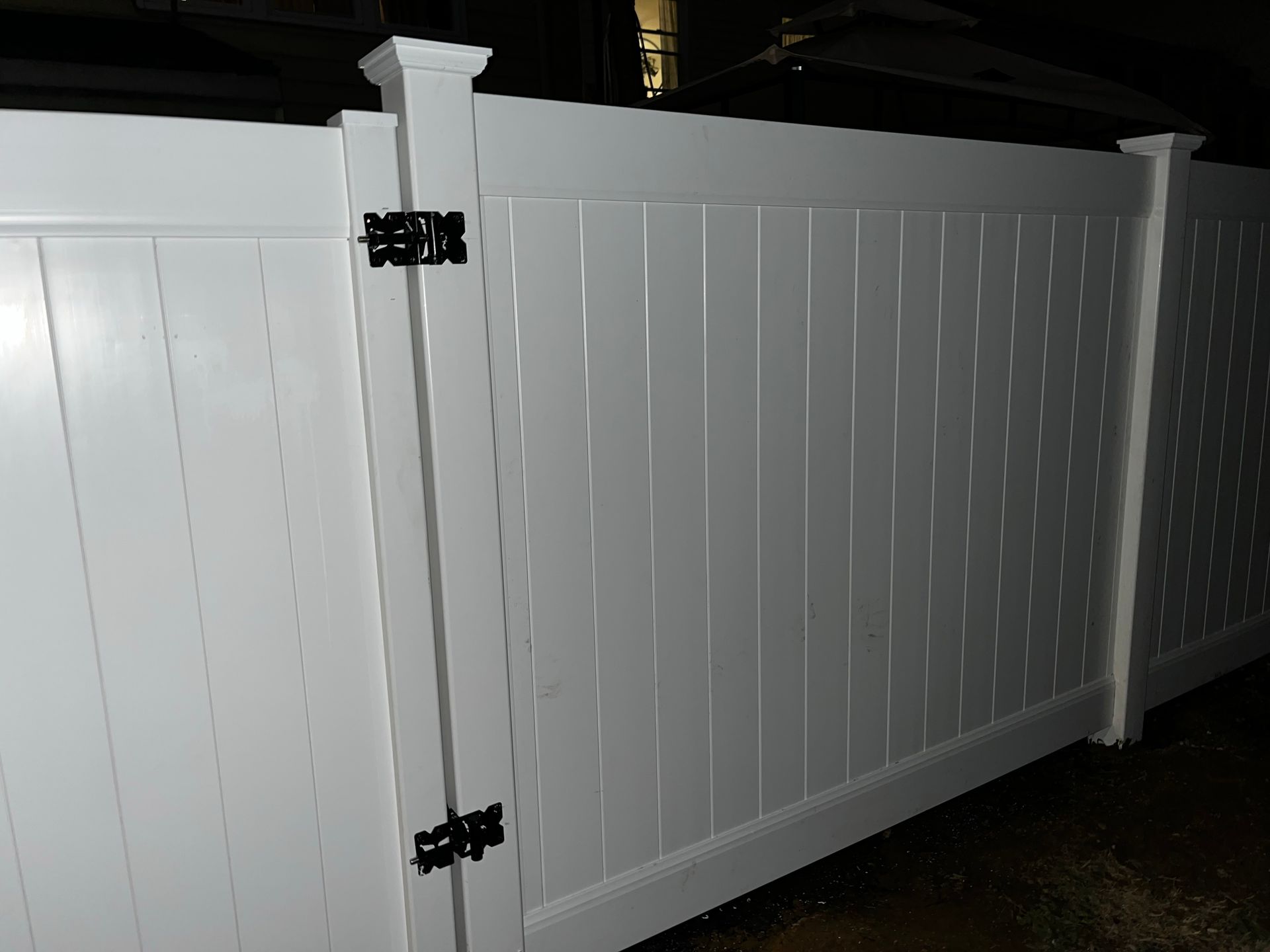 Completed residential white vinyl privacy fence project in Burlington County NJ