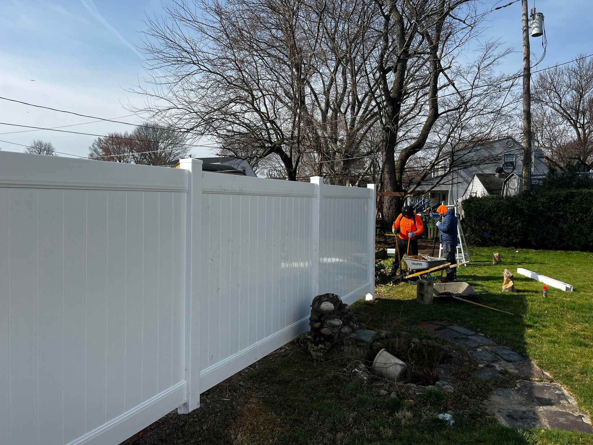 White vinyl fence installation in progress in Burlington County NJ