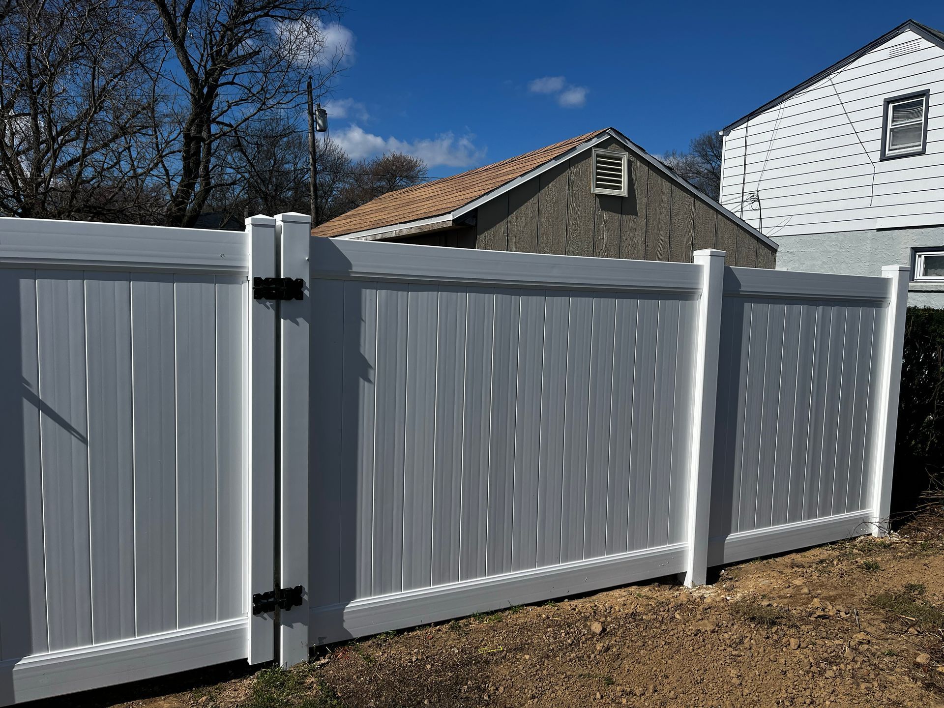 Custom white vinyl privacy fence gate project in Burlington County NJ