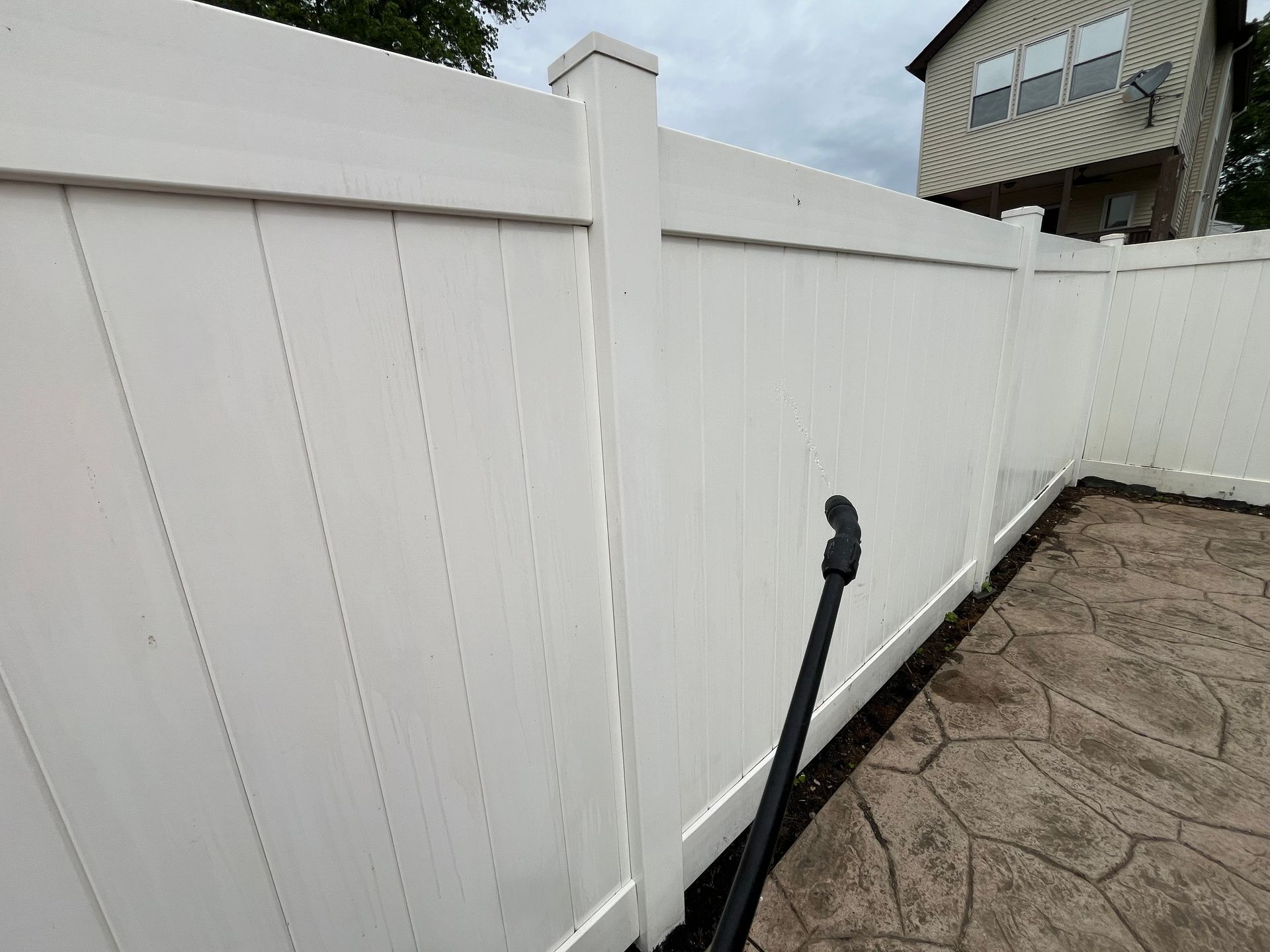 White vinyl fence corner panel installation in Burlington County NJ