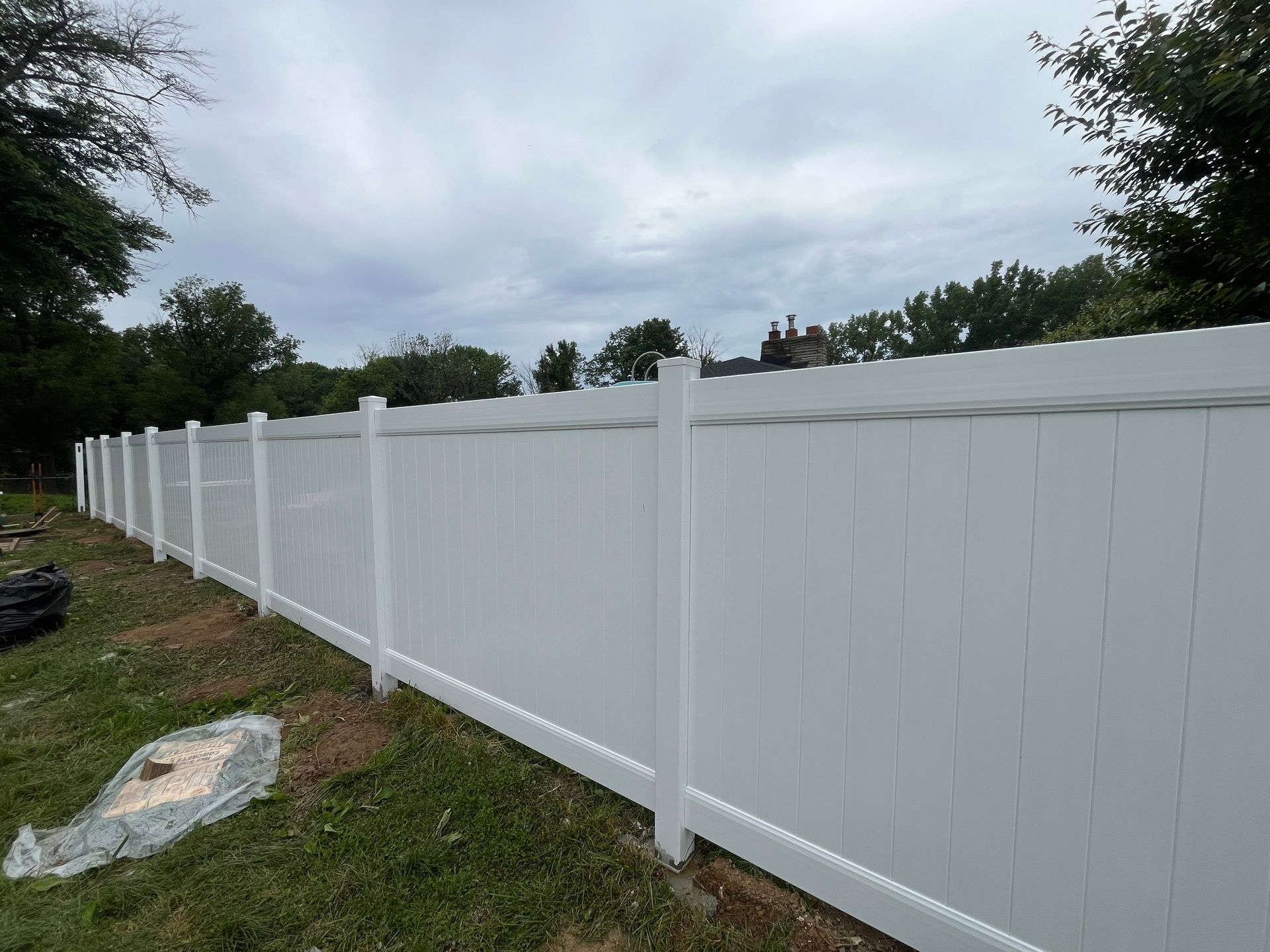 Long white vinyl privacy fence line in Burlington County NJ