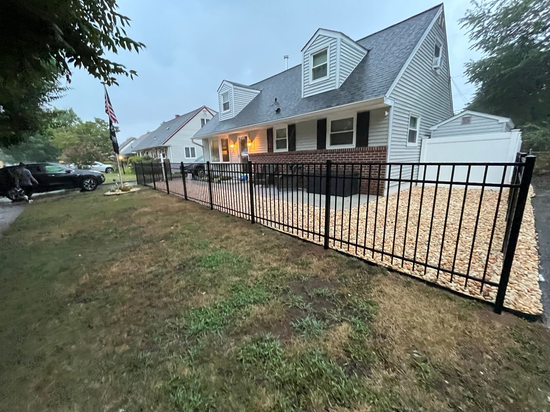 Black aluminum residential fence installation in Burlington County NJ