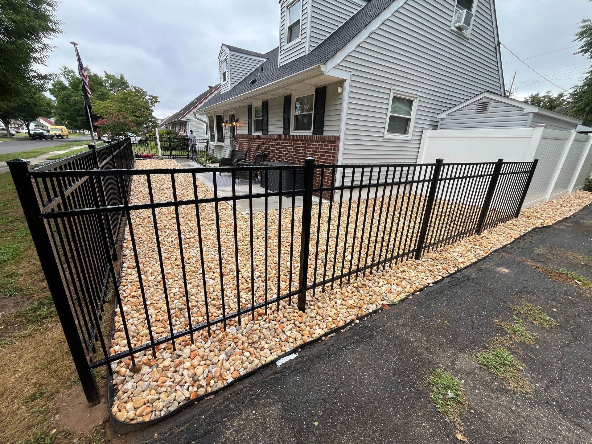Black aluminum front yard fence installation in Burlington County NJ