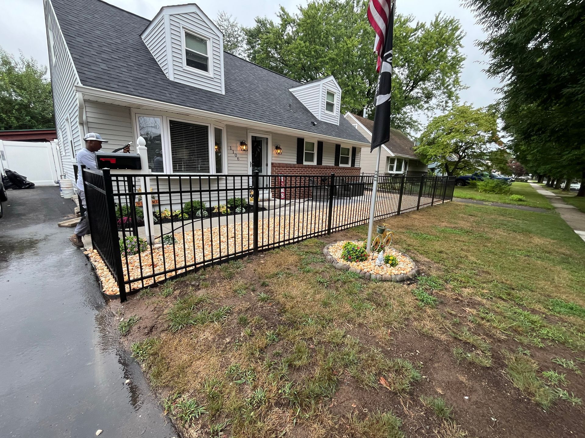 Custom black aluminum fence and gate installation in Burlington County NJ