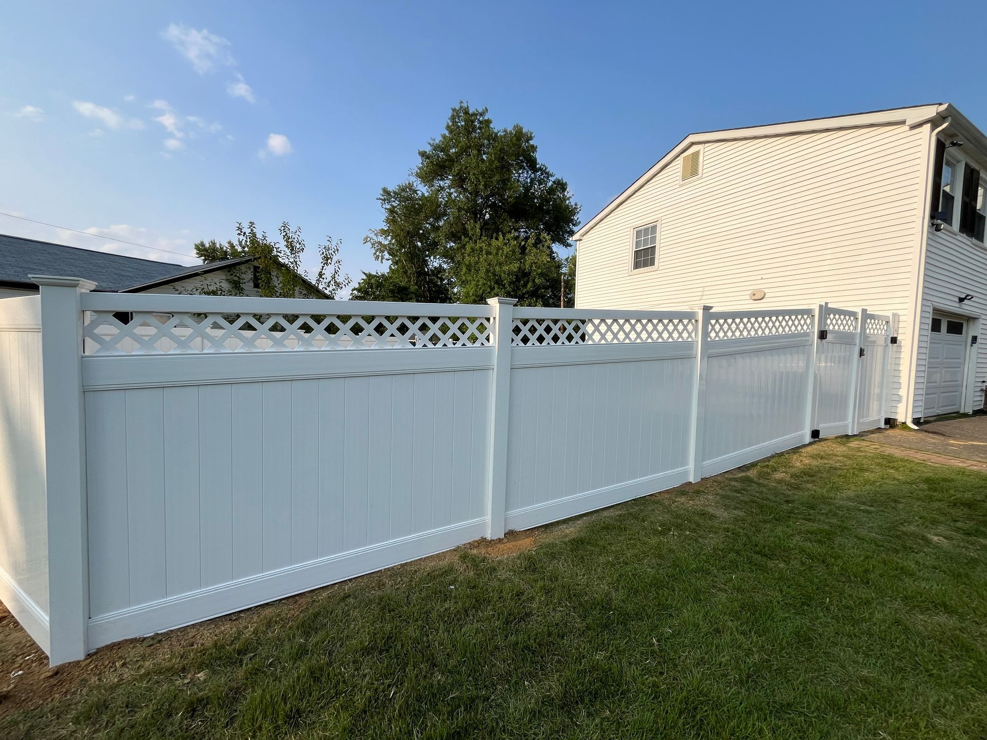 White vinyl lattice top fence installation in Burlington County NJ