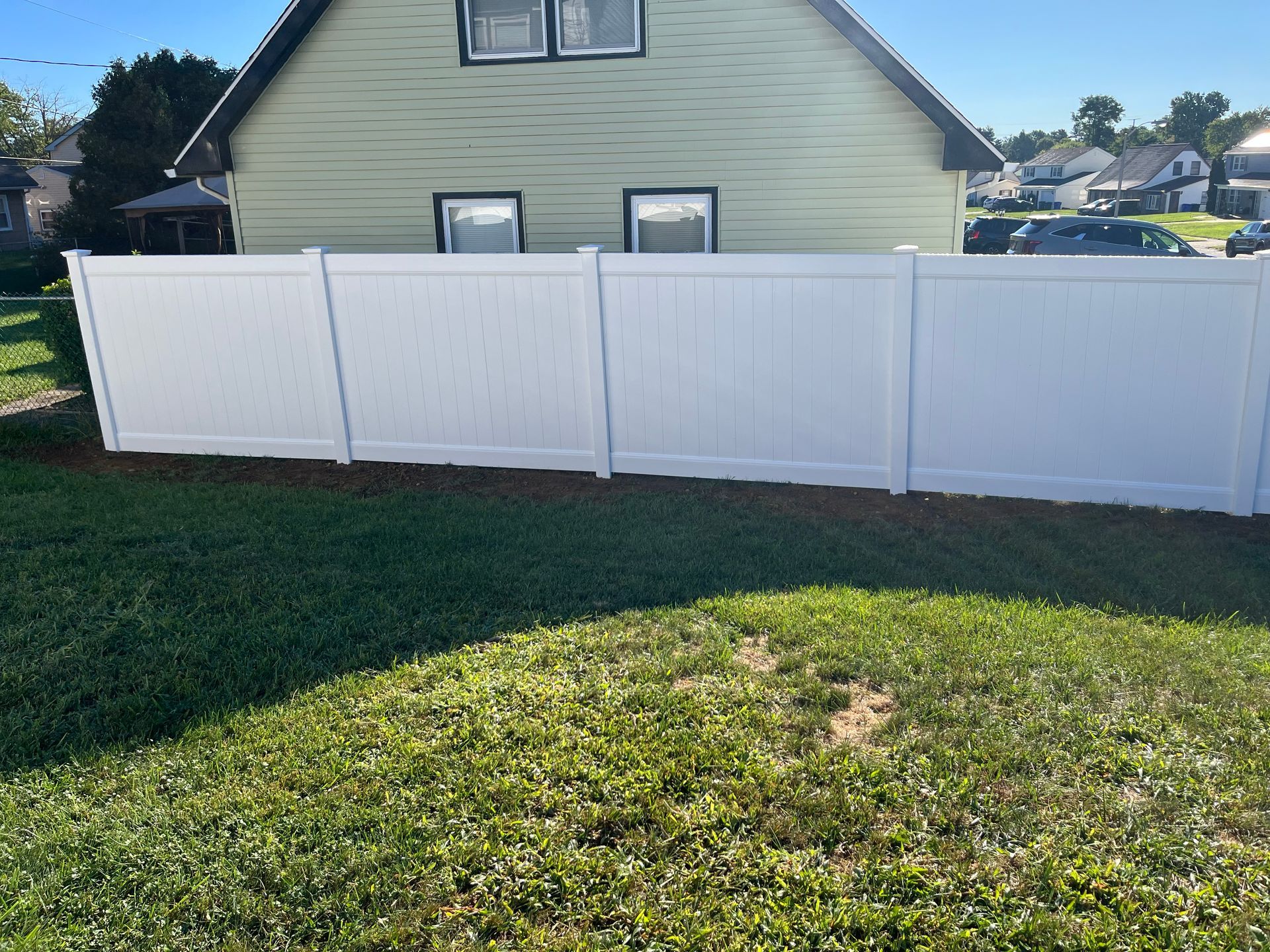White vinyl backyard privacy fence installation in Burlington County NJ