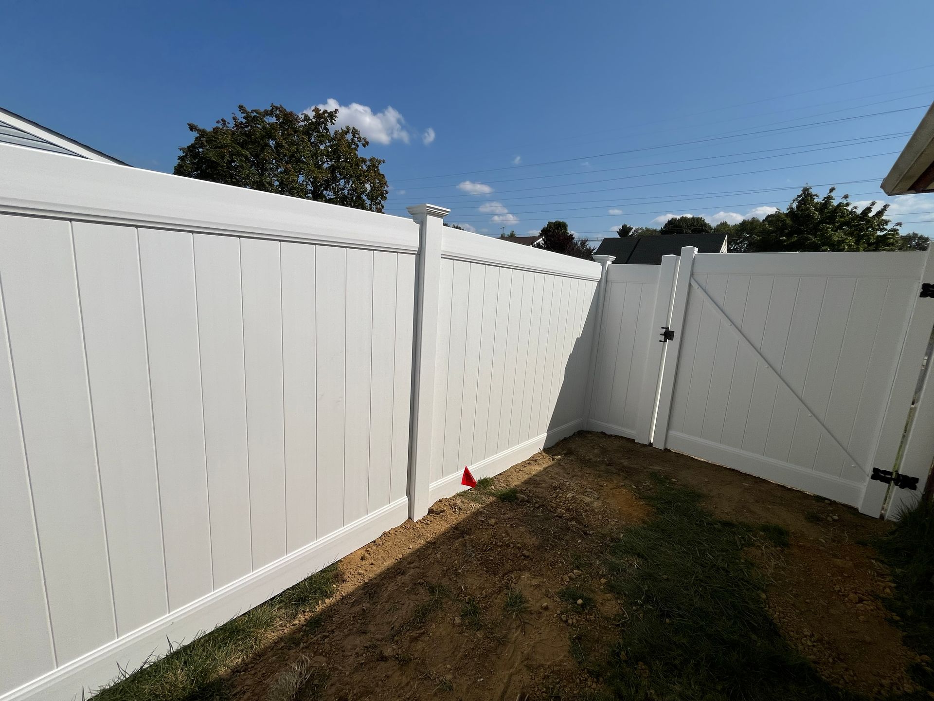 White vinyl privacy fence corner and gate installation in Burlington County NJ