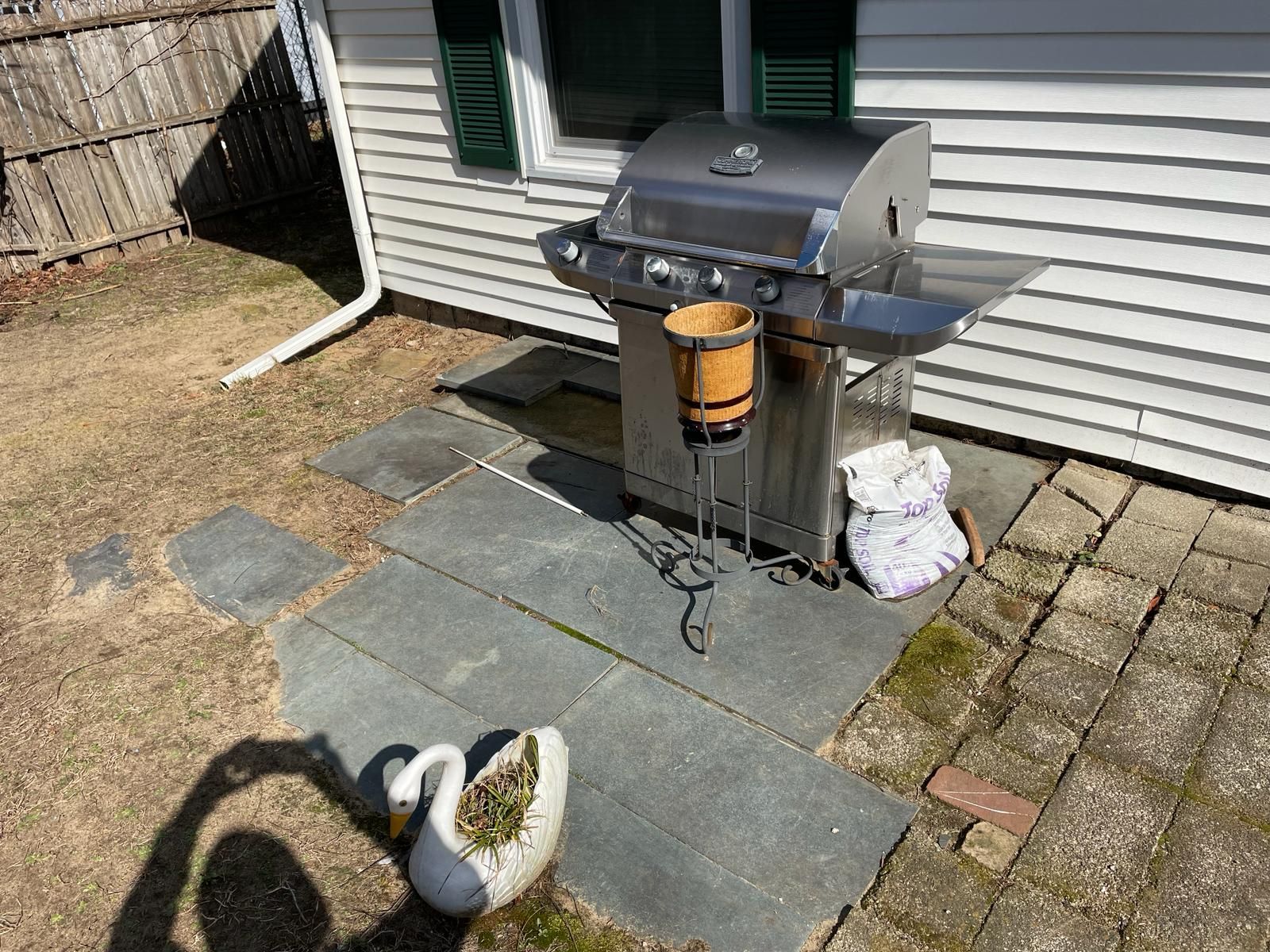Custom patio paver installation with outdoor grill area in Burlington County NJ