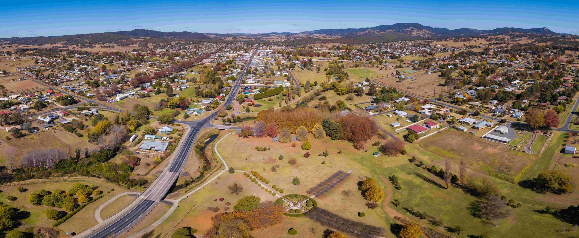 Aerial View of a Coastal Town With Houses — Darren Smith Roofing in Glendale, NSW