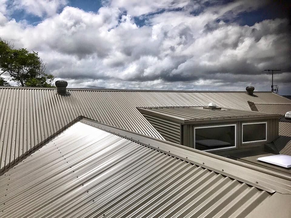 Metal Roof With Multiple Planes, Skylight, and Vents — Darren Smith Roofing In Glendale, NSW