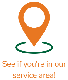Orange map pin over a green circle, 