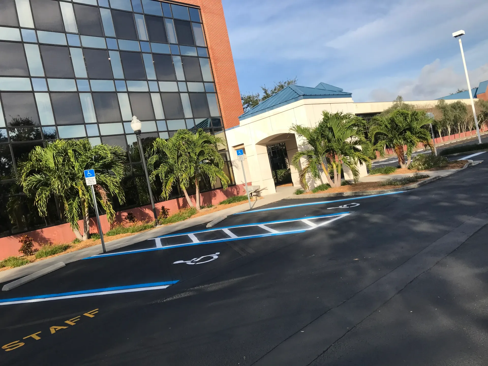 A handicapped parking spot in front of a building