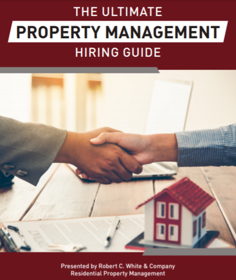 A book titled the ultimate property management hiring guide