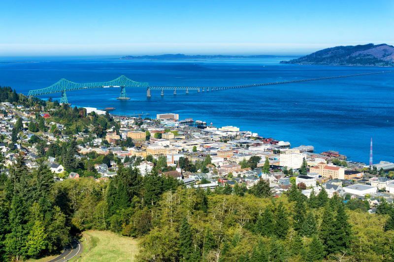An aerial view of a city next to a body of water.