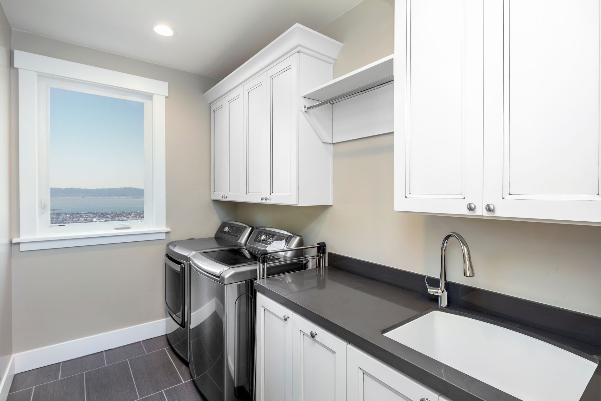 laundry room with cabinets. laundry room with cabinets.