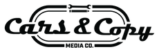 Cars & Copy logo with black text inside a black, racetrack-like oval.