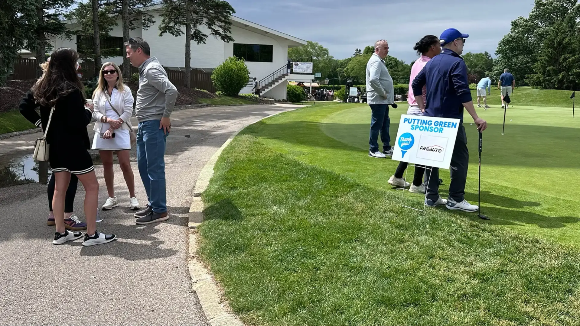 Golfers at the Putting Green Sponsored by ProAuto at the Northbrook Chamber VIP Golf Outing