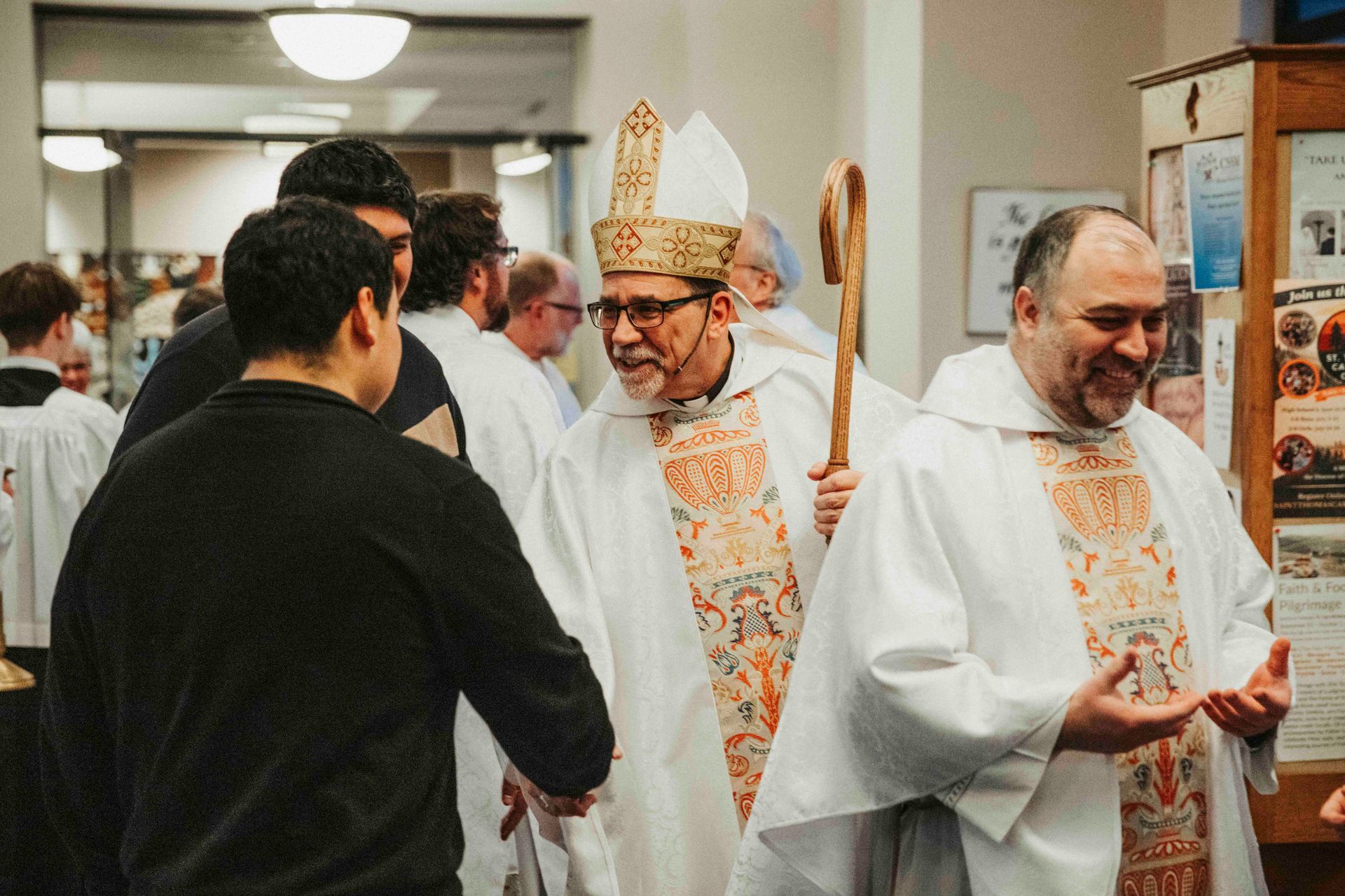 Bishop Jeff Fleming greeting parishioners