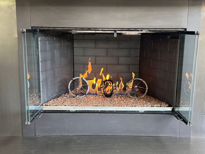 A fireplace with a lot of fire in it