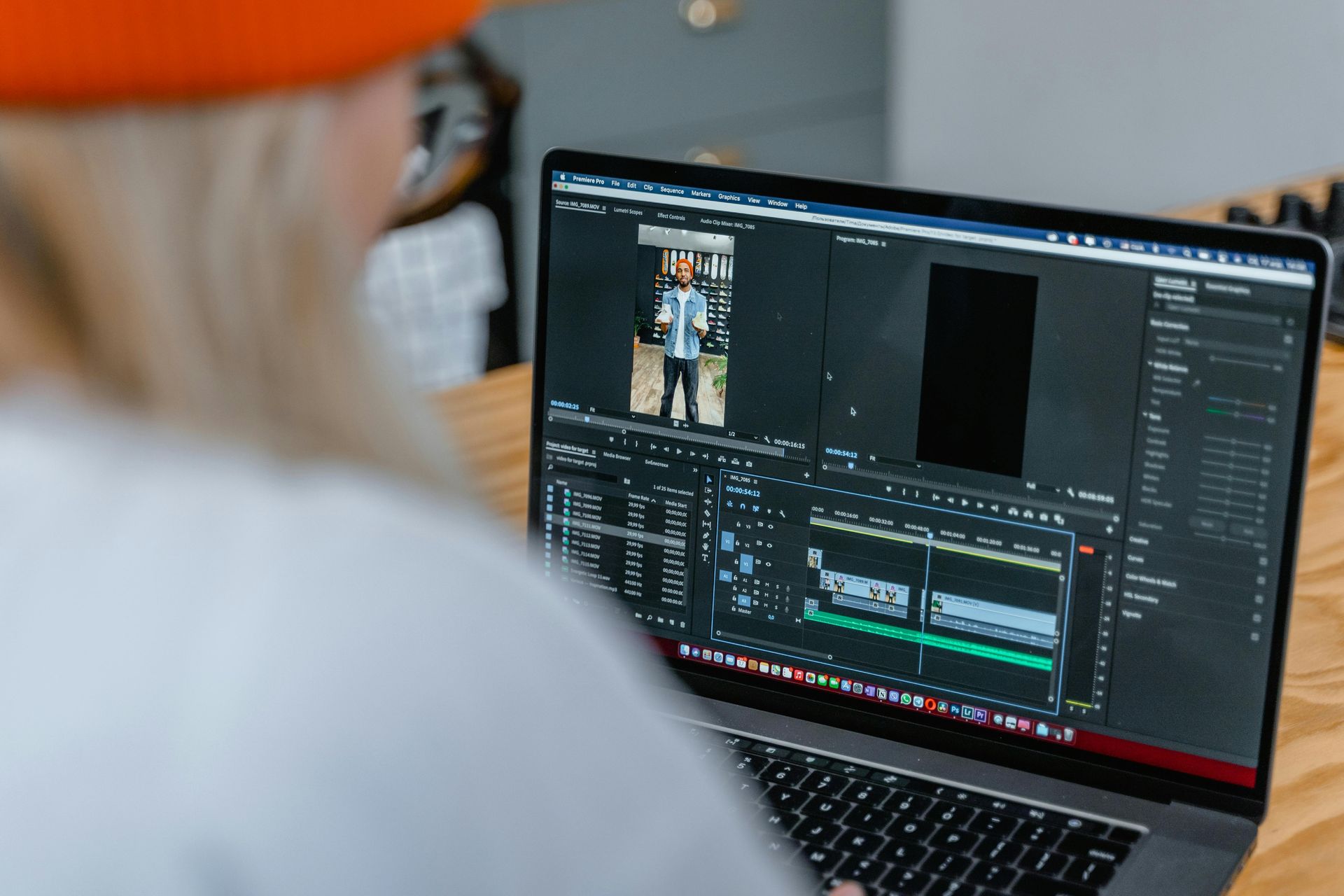 A microphone is sitting in front of a computer screen.