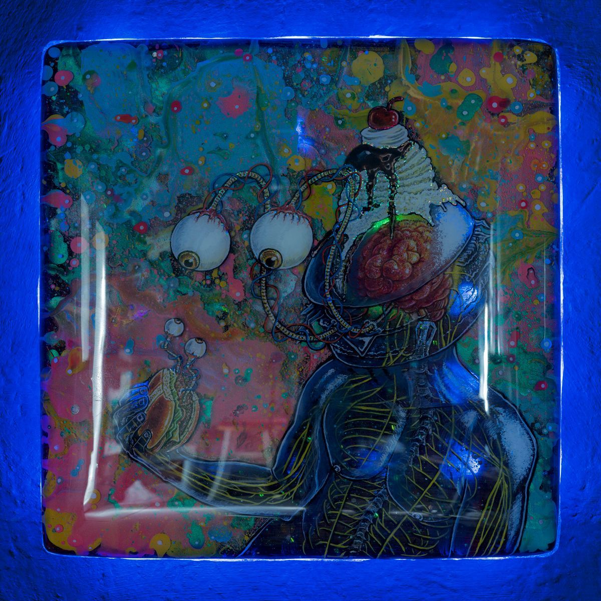 Art by Rich M Stevens. Abstract colorful artwork of a figure with large white eyes and a bright blue background