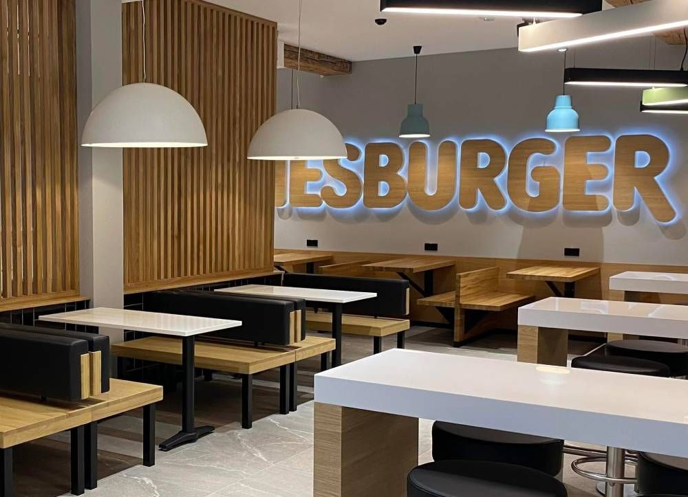 Reconstruction of a store building into a café with an additional function