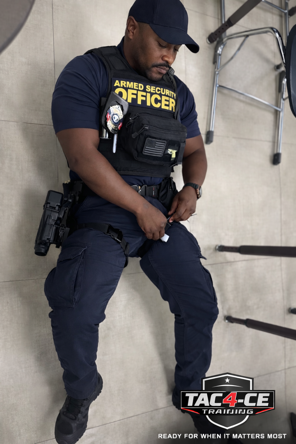 Armed security officer applying tourniquet during TAC-4CE trauma and medical training in South Florida