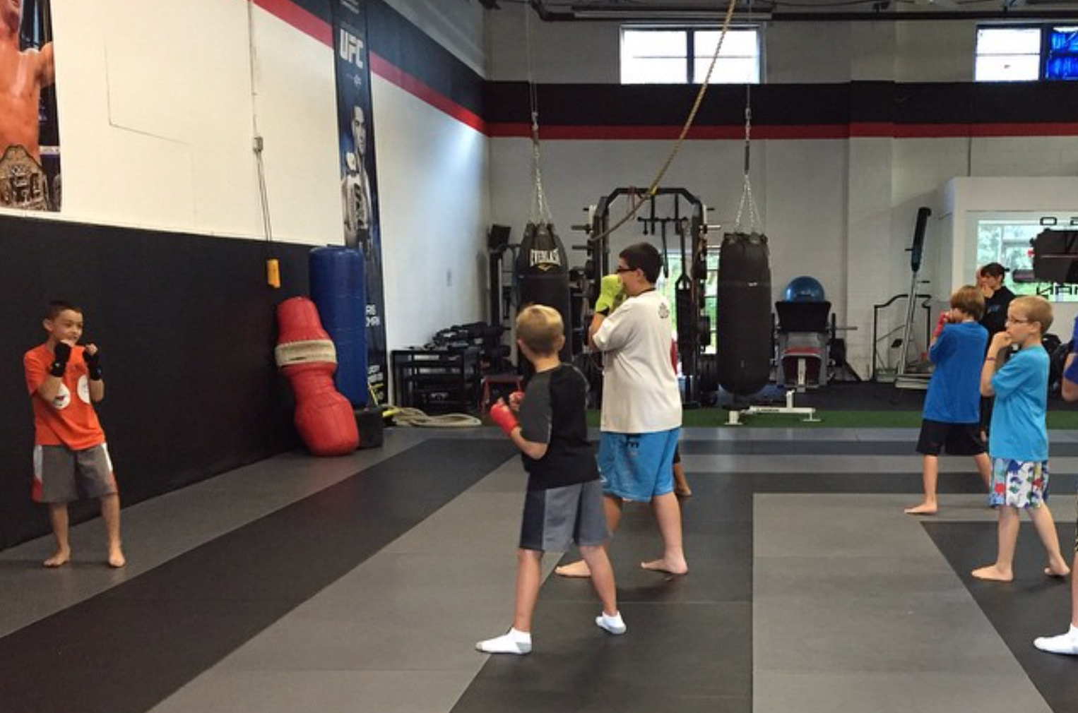 Teen students practicing Brazilian Jiu Jitsu drills at Ray Longo's Mixed Martial Arts in Garden City
