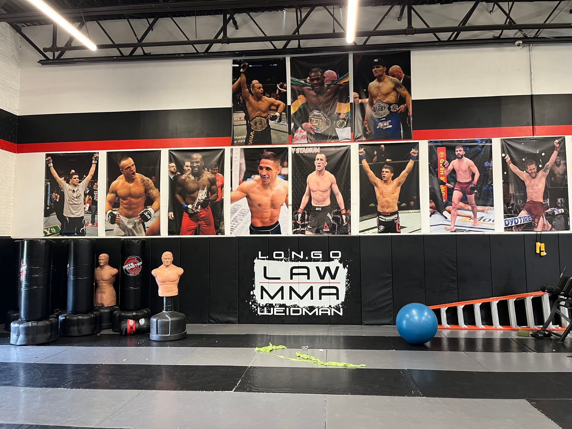Students training drills at Ray Longo's Mixed Martial Arts in Garden City, NY to build confidence and resilience.