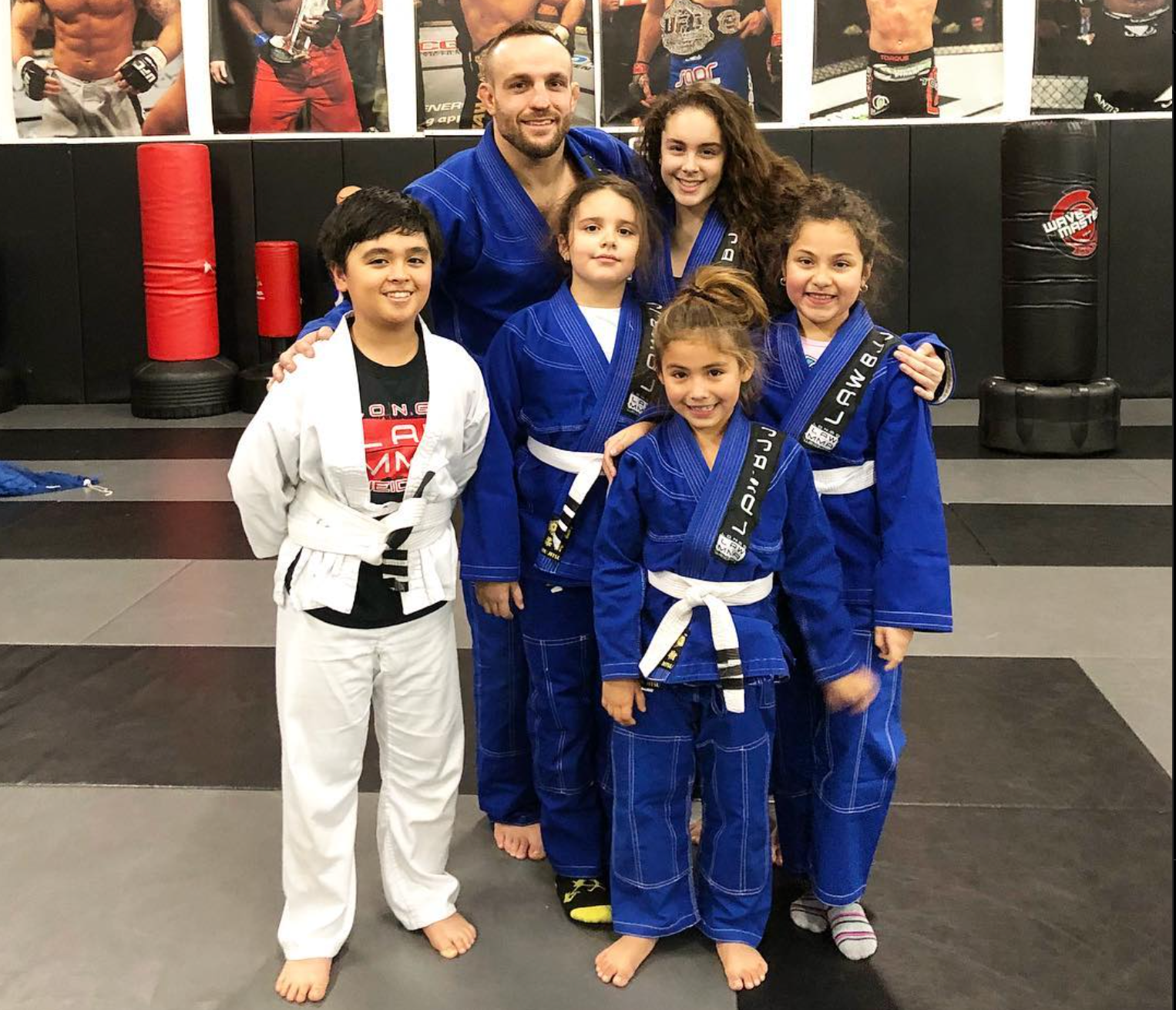 Beginners drilling boxing and Brazilian Jiu Jitsu at Ray Longo's Mixed Martial Arts in Garden City.
