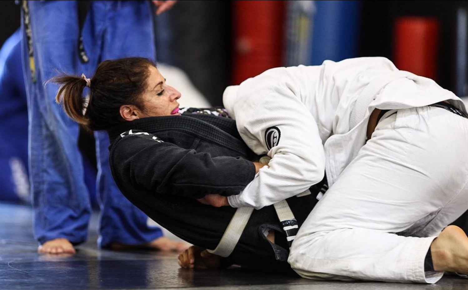 Beginners practicing jab-cross and basic grappling at Ray Longo's Mixed Martial Arts in Garden City.