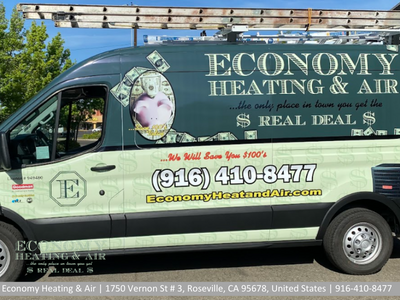 A van that says economy heating and air on it