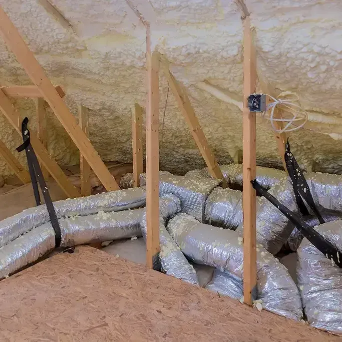 There are a lot of ducts in the attic.
