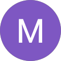 The letter m is in a purple circle on a white background.