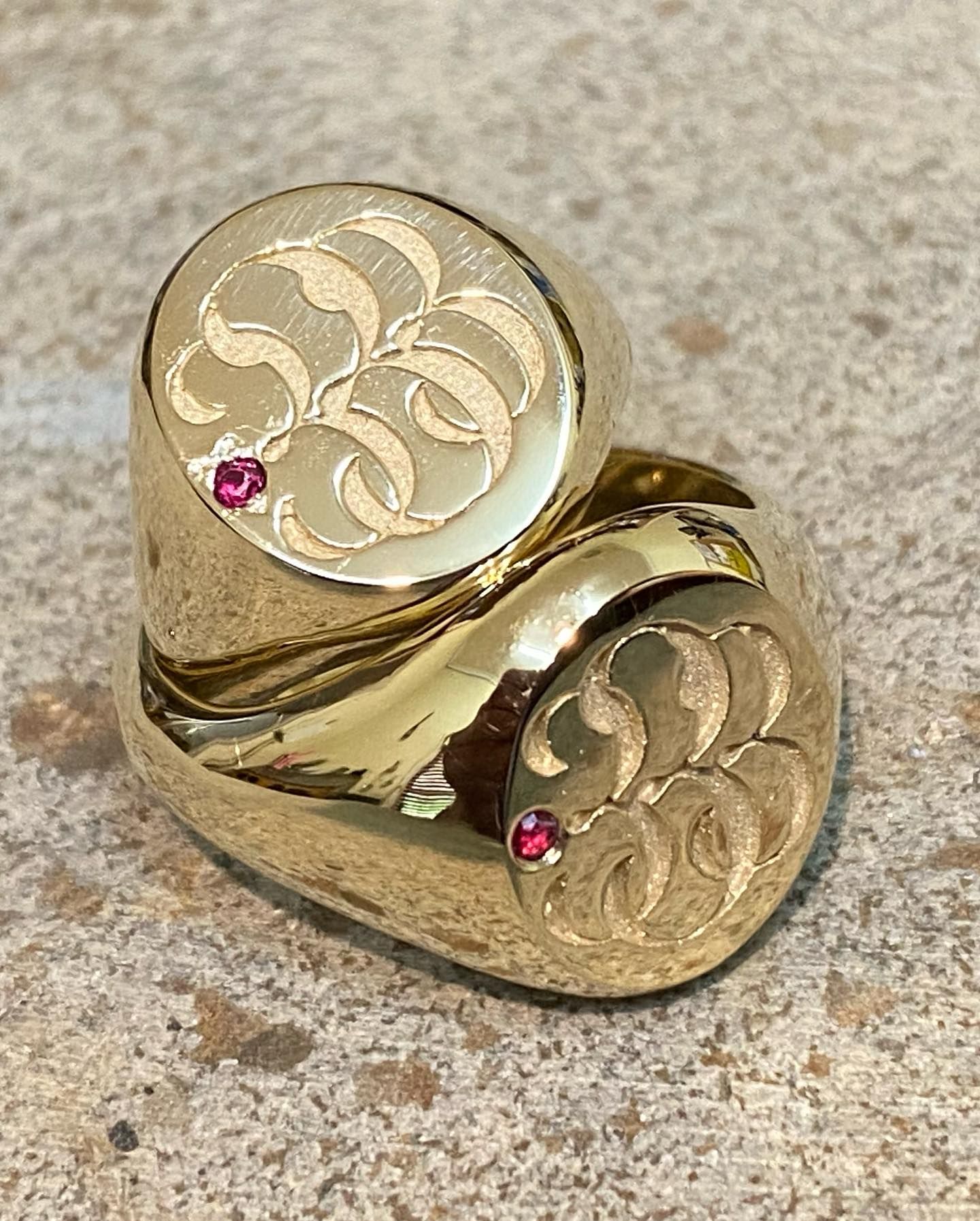 Two Gold Signet Rings With Engraved Flourishes And Ruby Accents — Burchell's Jewellers In Bowral, NSW