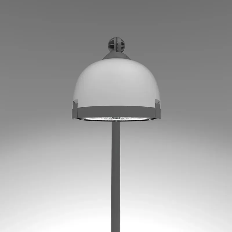 Decorative park luminaire mounted on a pole for outdoor area lighting.