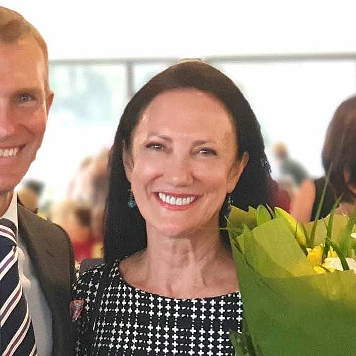 Smiling woman photographed at a community event inside a Northern Beaches RSL