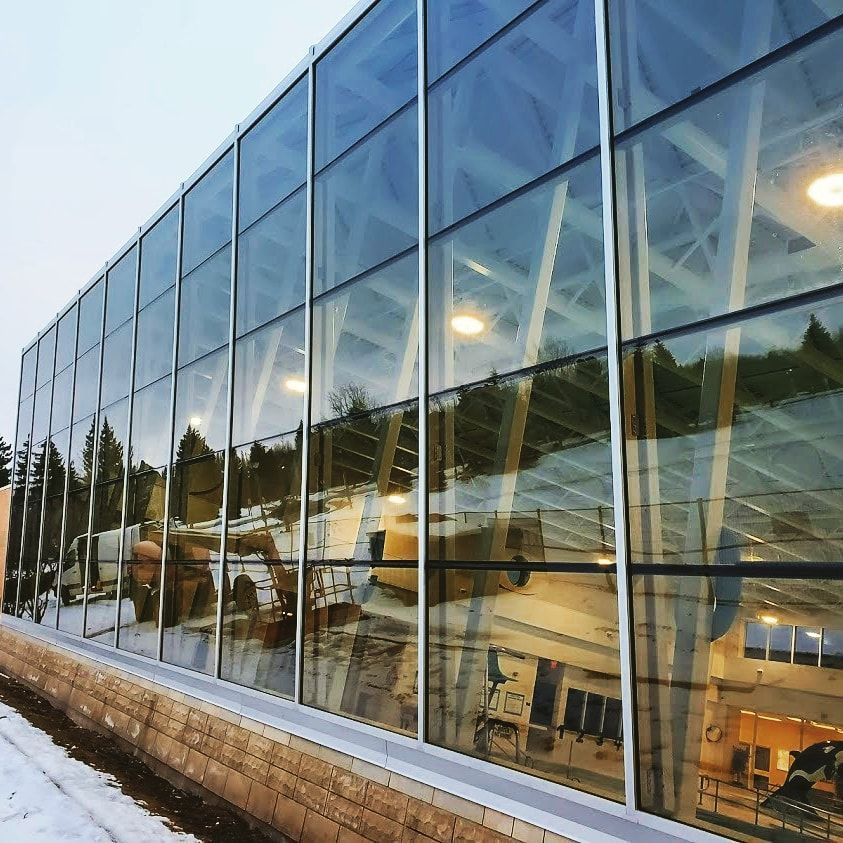 A large building with a lot of glass windows