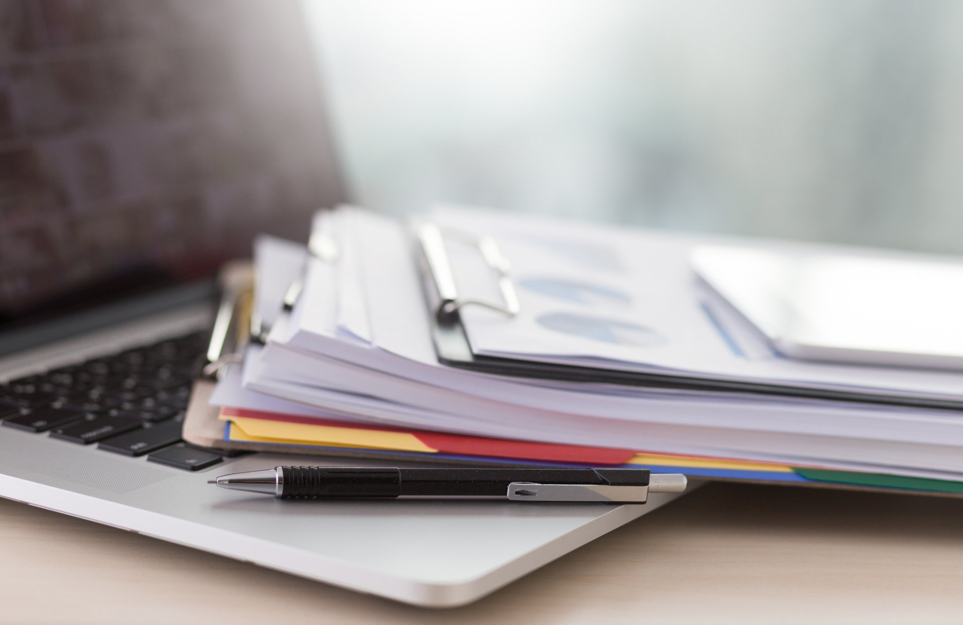 laptop with documents