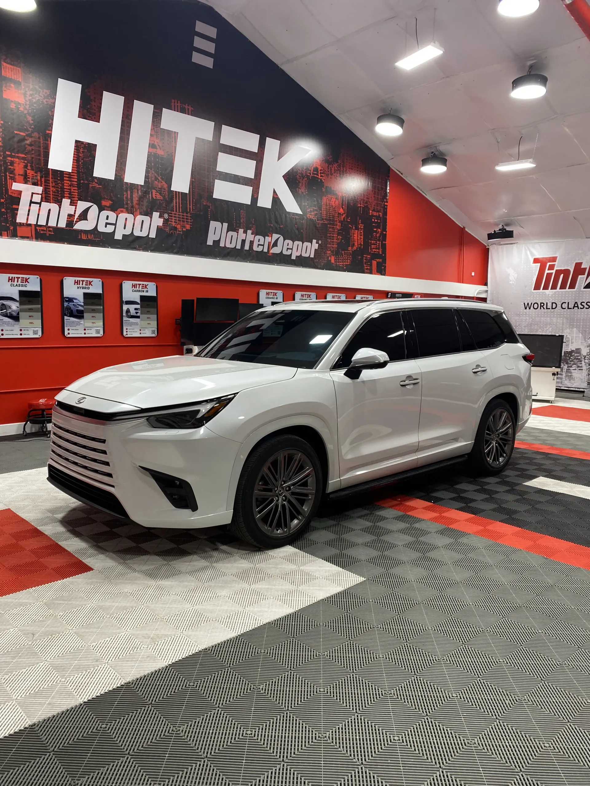 White SUV parked inside a 