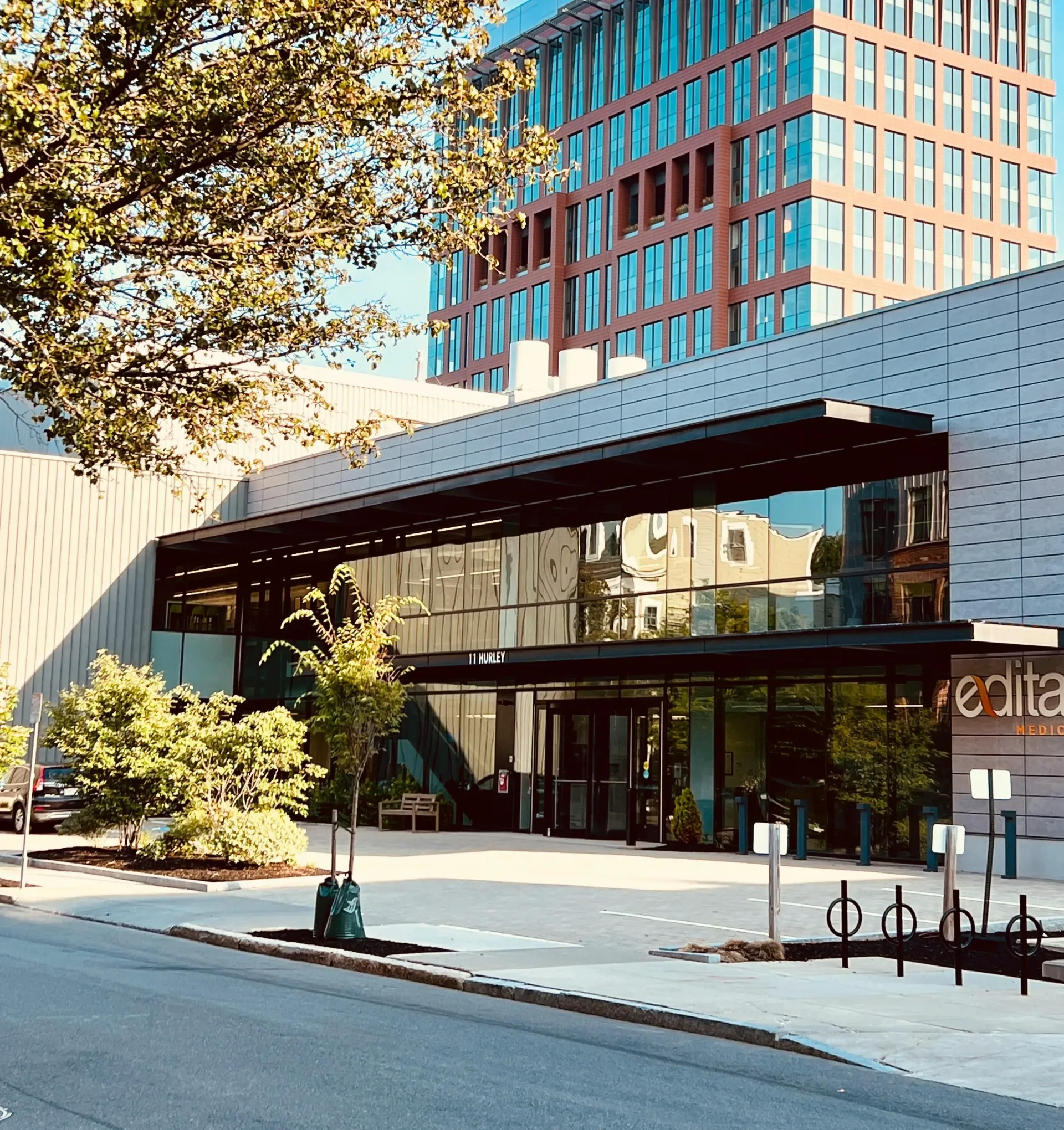 Modern building entrance with glass doors, 