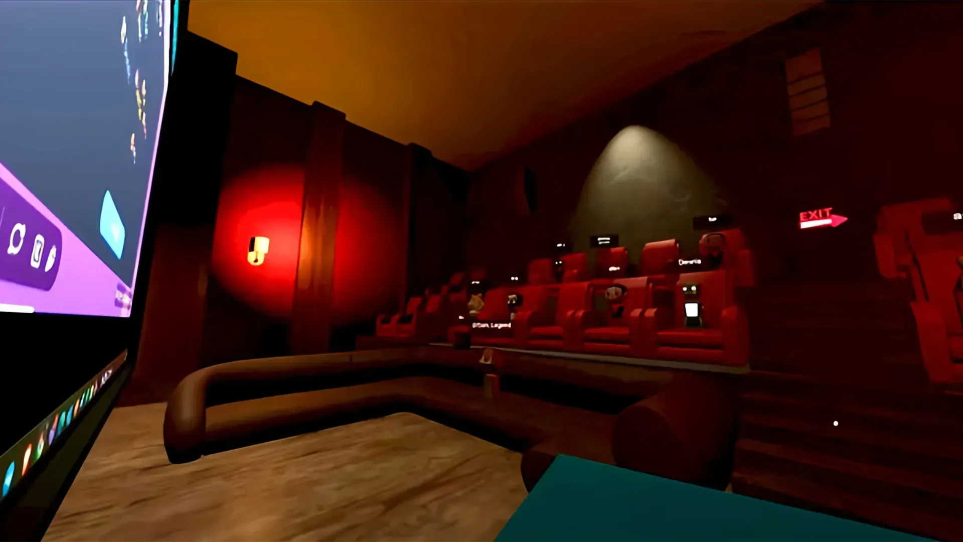 Virtual theater with avatars in red seats watching a large interactive screen.