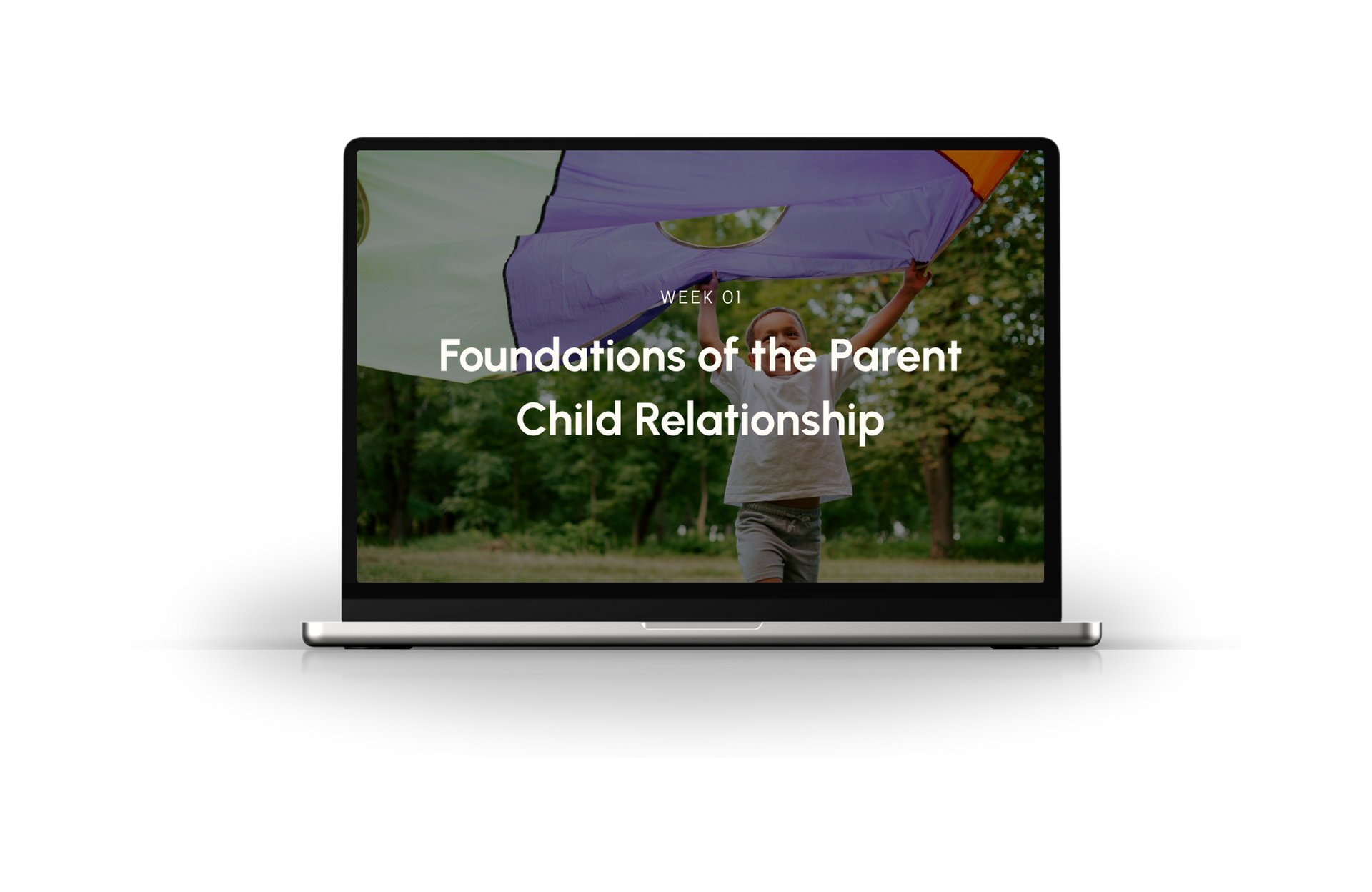 Laptop displaying “Foundations of the Parent Child Relationship” over a tree-lined background